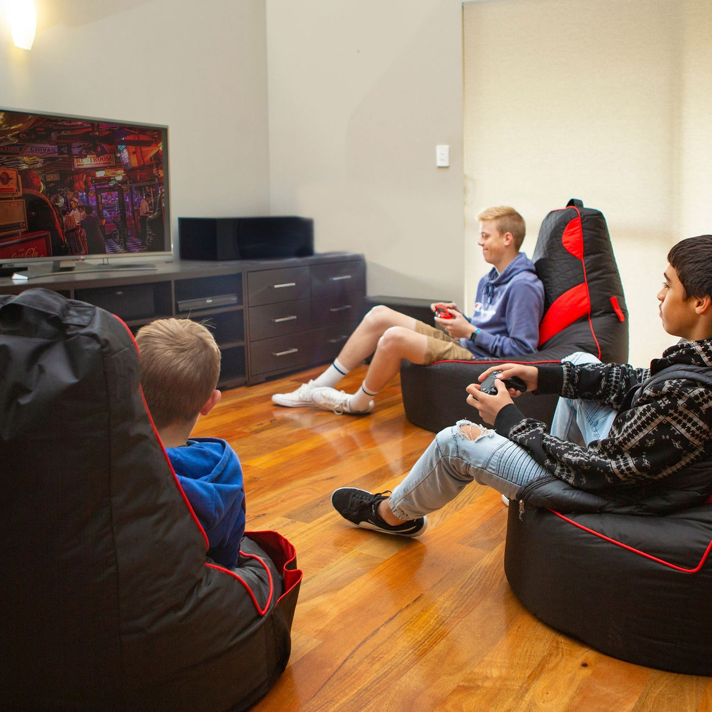 files/teenagers-gaming-in-lounge-room.jpg